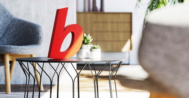 Titelseite Eigenheimindex mit rotem Regiobank b im Wohnzimmer